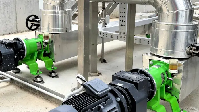 Two Kronoa Engineered Solutions progressive cavity pumps installed at a wastewater treatment plant (WWTP) for efficient sludge handling.